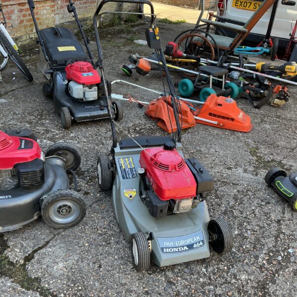 Honda Pan European petrol lawnmower in a garden setting.