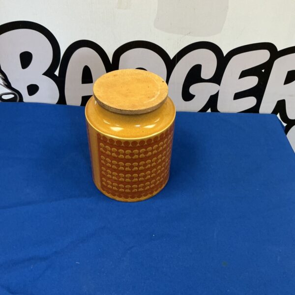 Vintage Hornsea pottery biscuit barrel with floral embossed pattern.