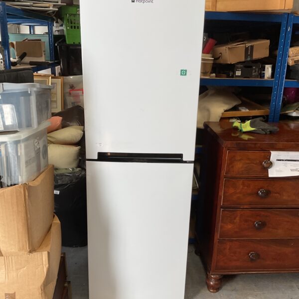 White Hotpoint fridge freezer in a home setting.
