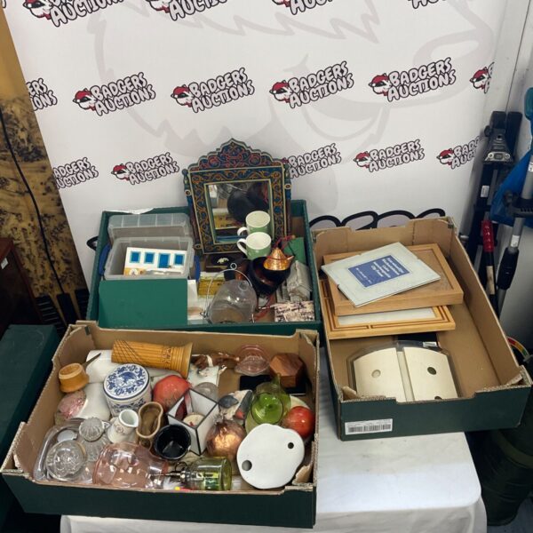 House clearance lot featuring an Indian mirror and glassware.