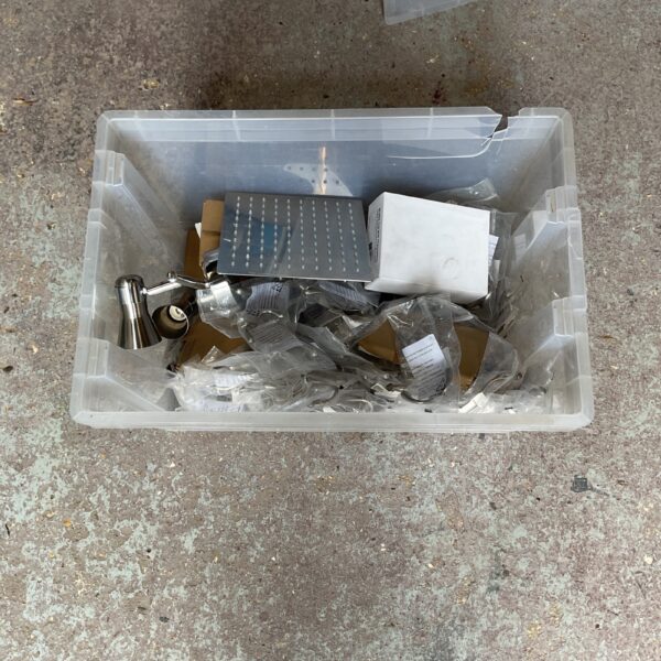 Housing appliance lot with shower head, coat hooks and lights.