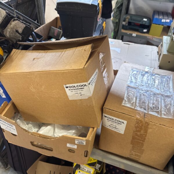 Stack of boxes containing reusable ice freeze packs.