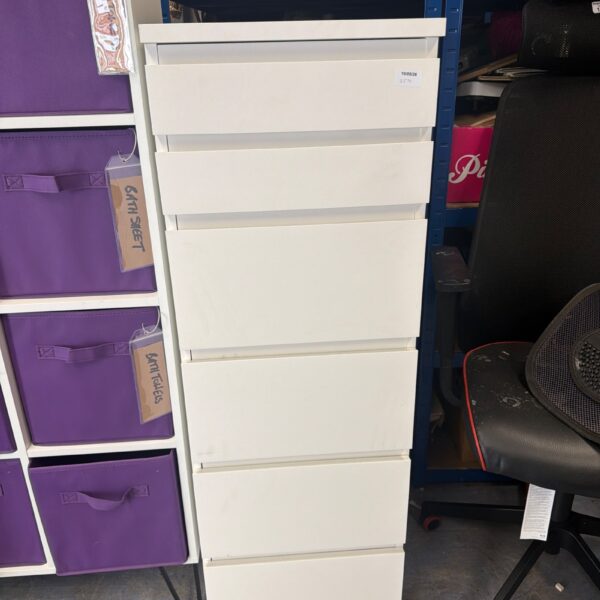 White IKEA MALM chest of drawers with six drawers for bedroom storage.