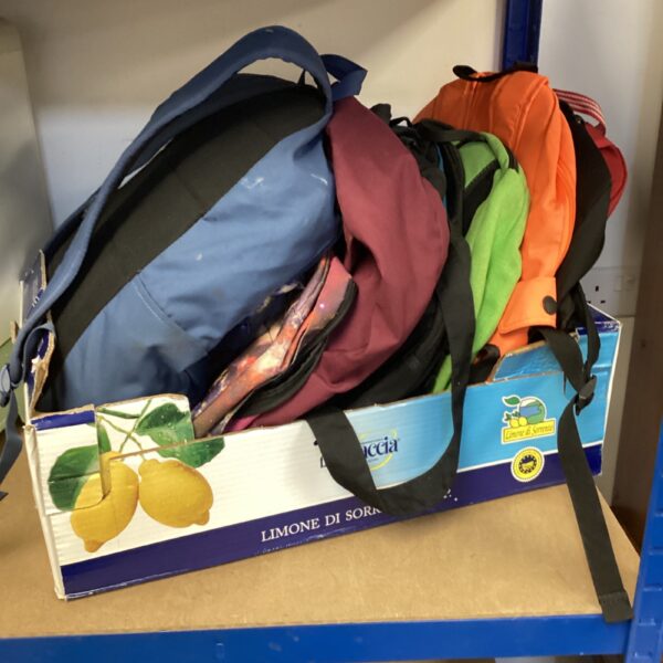 A box of rucksacks inc Adidas