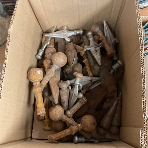 Box of vintage metal finials