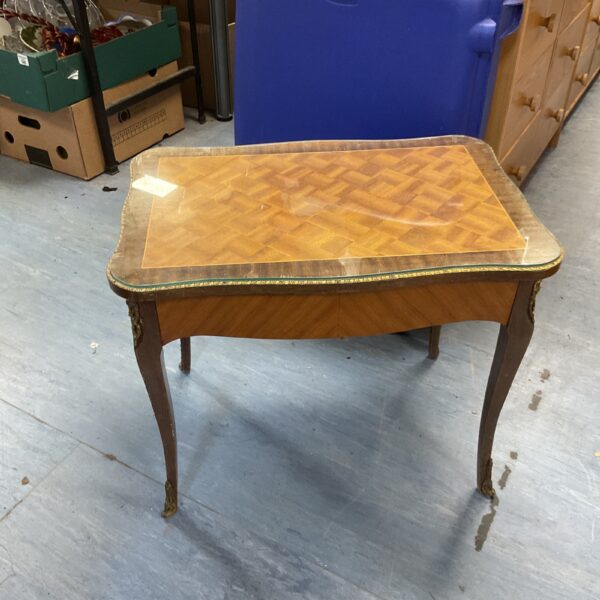 Brass inlaid glass topped coffee table