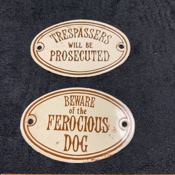 Two enamel gate signs beware of ferocious dog and trespassers will be prosecuted