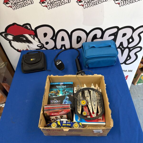 Lots of mixed goods, including Tron legacy DVD Blu-ray and battleship figurines