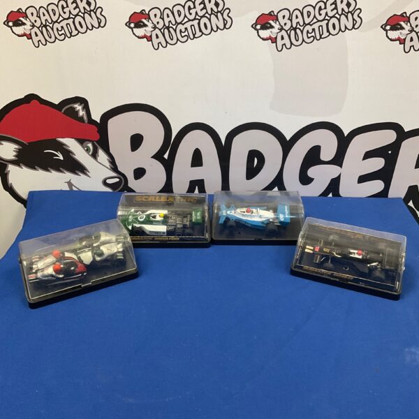 4 Scalextric racecars incl. March Ford, Lotus 77 car and two motorbikes