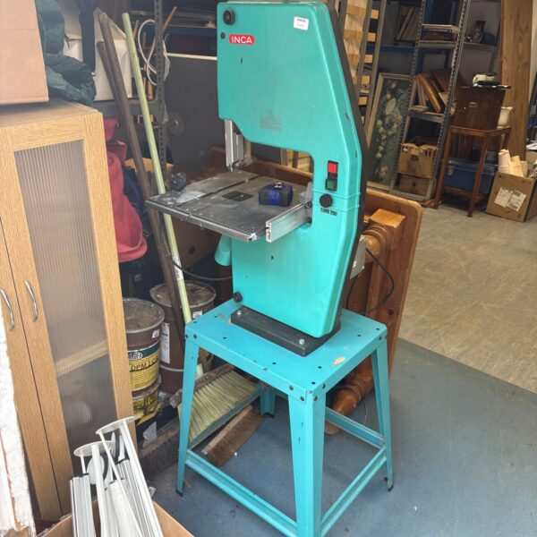 Inca Euro 260 bandsaw in workshop setting, vintage woodworking tool.