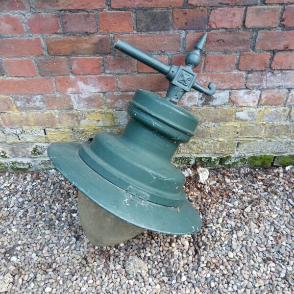 Vintage industrial wall lamp with enamel finish.