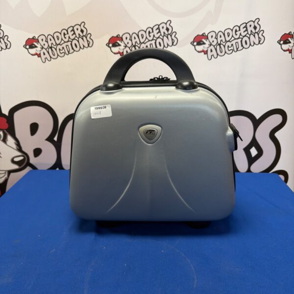 Front view of a used IT Luggage cabin case.