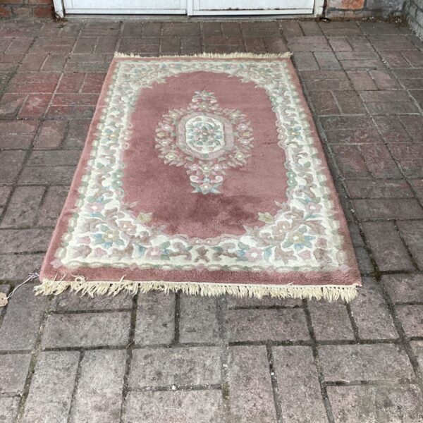 Vintage Jalna Indian carpet rug with floral design.