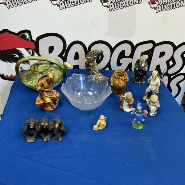 Vintage Japanese figurine collection featuring ceramic statues.