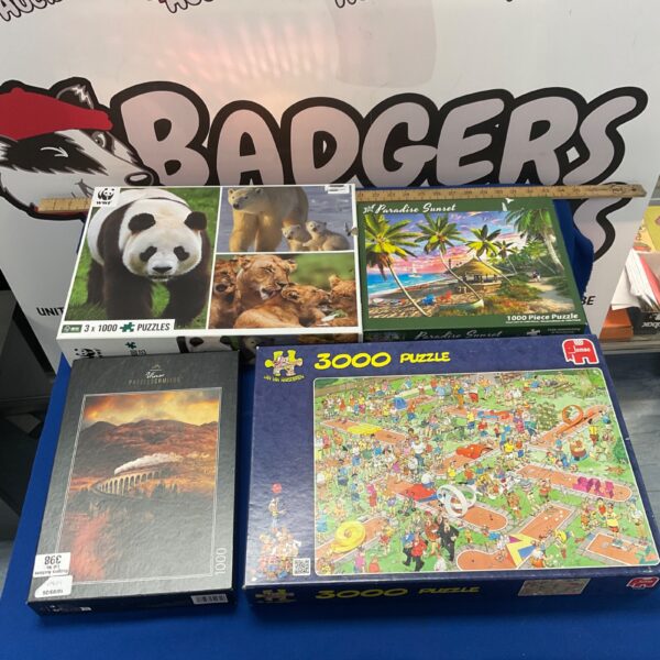 Vintage jigsaw puzzle lot including WWF, Jumbo, and Ulmer brands.
