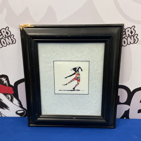 Framed John Speigal print of a vibrant, colourful dancer.