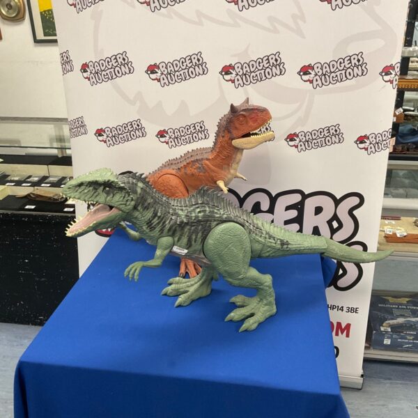 Vintage Jurassic Park dinosaur toys, Tyrannosaurus Rex and Velociraptor.