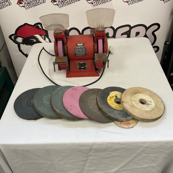 Kango Wolf bench grinder with spare grinding wheels.