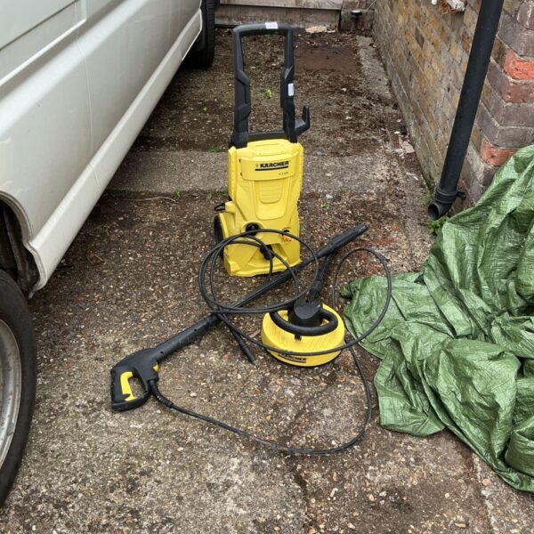 Karcher power washer with patio cleaning attachment in used condition.