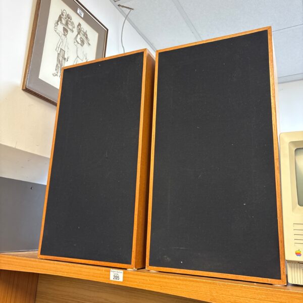 Vintage KEF 104 bookshelf speakers in wood veneer.