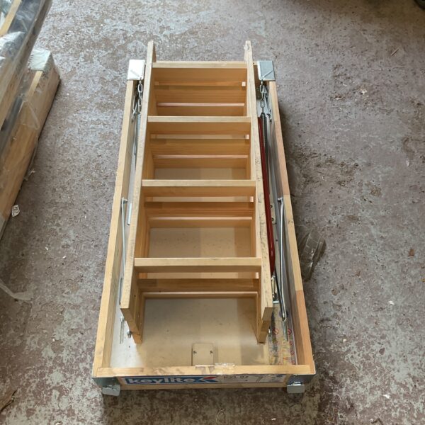 Keylite loft hatch kit with folding ladder, ready for installation.