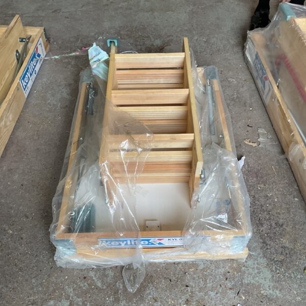 Keylite loft hatch still sealed in plastic packaging.