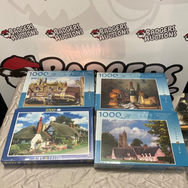Sealed lot of four King 1000-piece jigsaw puzzles.