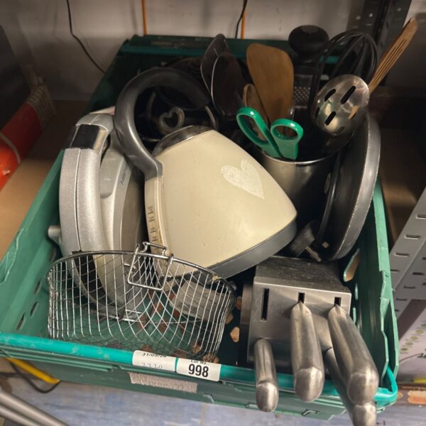 Tray of assorted metal and plastic kitchen utensils.
