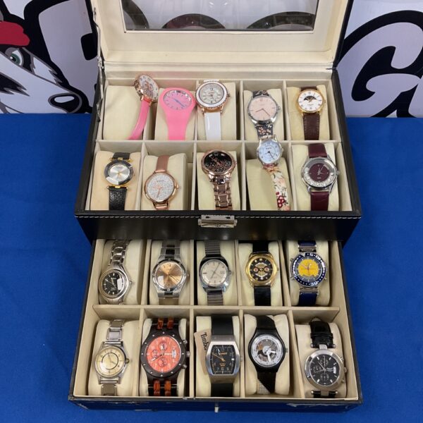 Ladies watch collection in a display case, including Radley and Timex.
