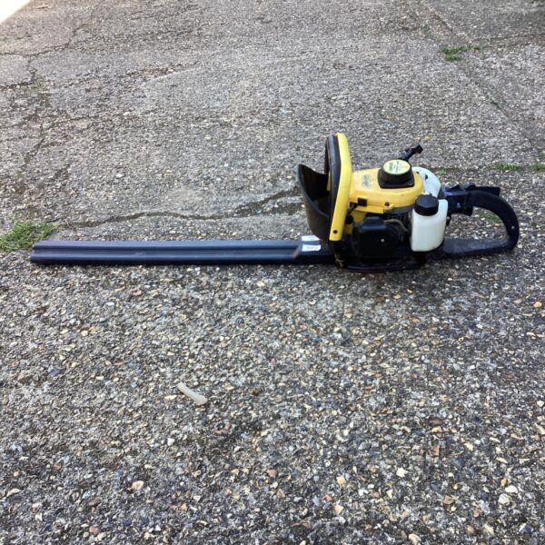 Used Landxcape petrol hedge trimmer for garden landscaping.