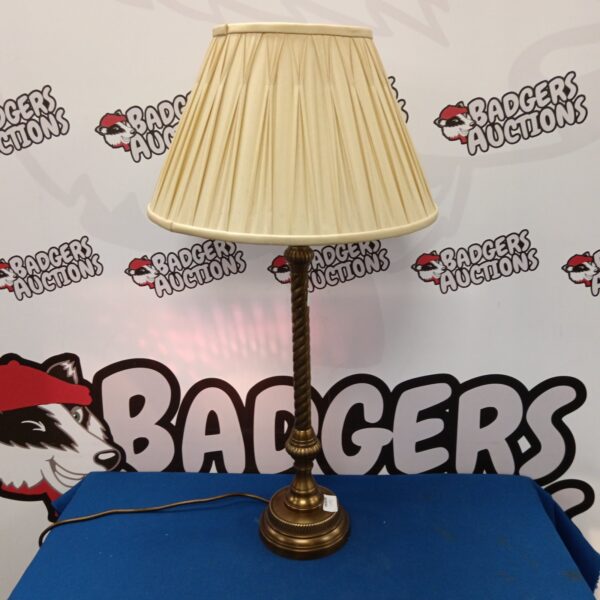 Elegant Laura Ashley brass table lamp with twist stem design.