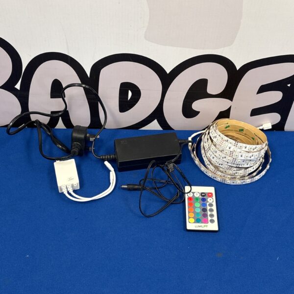 Roll of flexible LED strip lighting with power supply and remote.