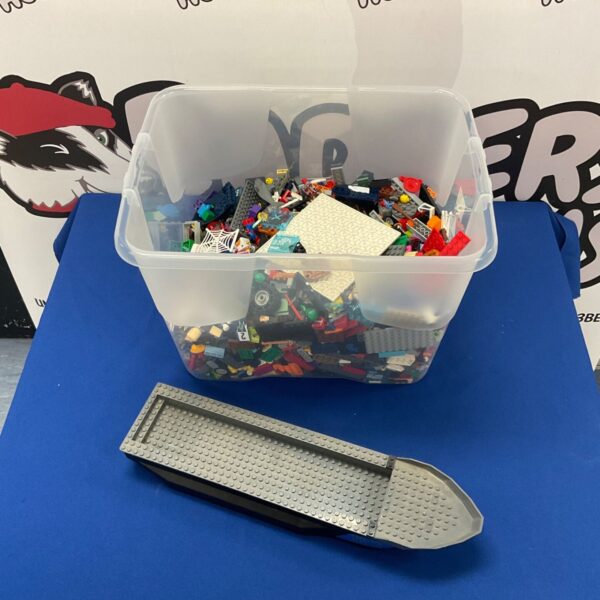 Large lot of assorted Lego pieces and minifigures for building.