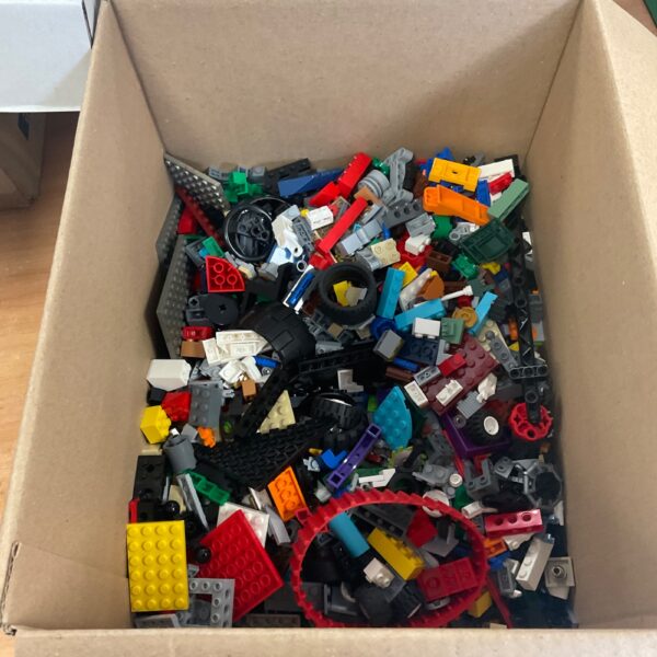 Assorted Lego bricks in a bulk lot for building and play.