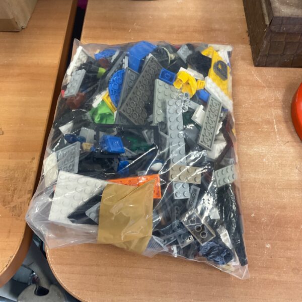 Mixed lot of colourful Lego bricks for building and play.