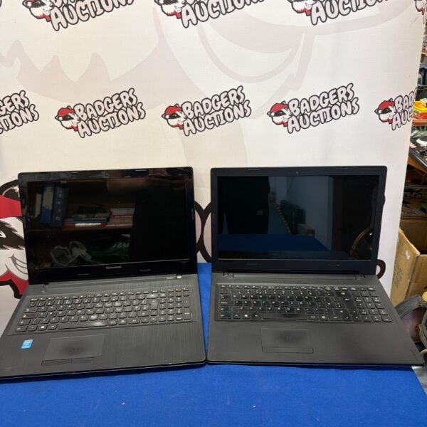 Two Lenovo laptops presented as a lot for parts or repair.
