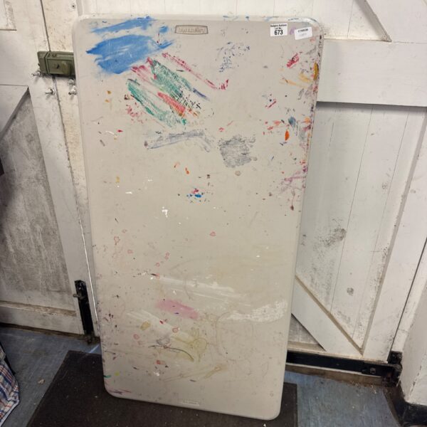 Used Lifetime 4ft heavy duty folding table with surface wear.