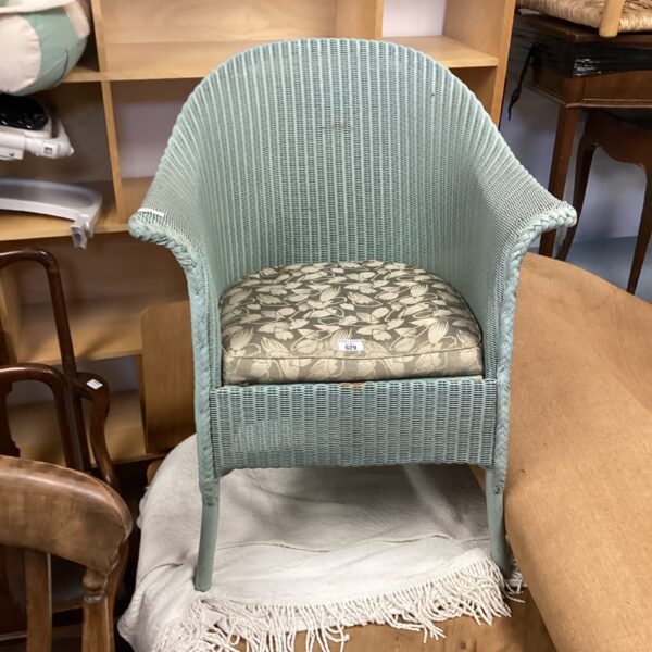 Vintage Lloyd Loom bedroom chair with woven seat and painted frame.