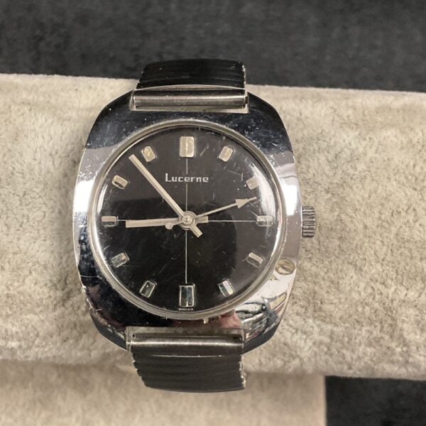 Vintage Lucerne wristwatch with black dial and classic design.