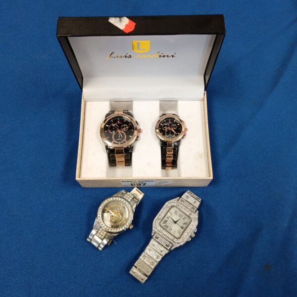 Luis Cardini his and hers watch set in presentation box.