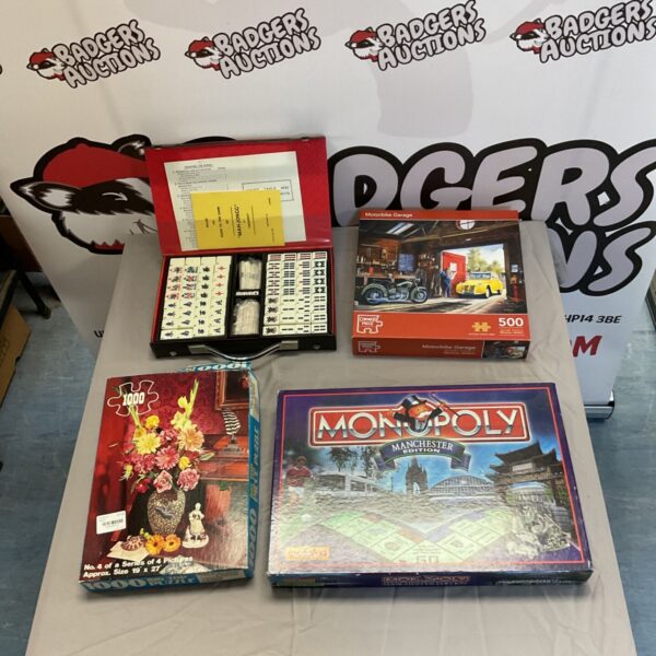Mahjong set, Monopoly Manchester Edition, and two jigsaw puzzles bundle.