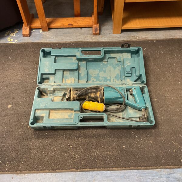 Vintage Makita reciprocating saw in its original carrying case.