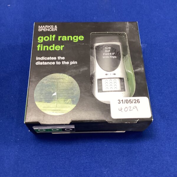 Marks & Spencer golf range finder displaying yards and metres measurement scale.