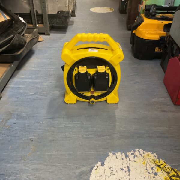 Yellow Masterplug weatherproof cable reel with two sockets for outdoor use.