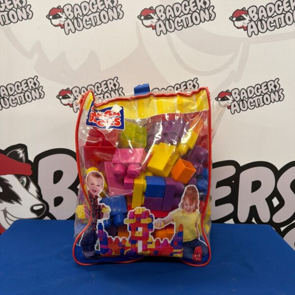 Colourful Mega Blocks building blocks in a plastic bag.