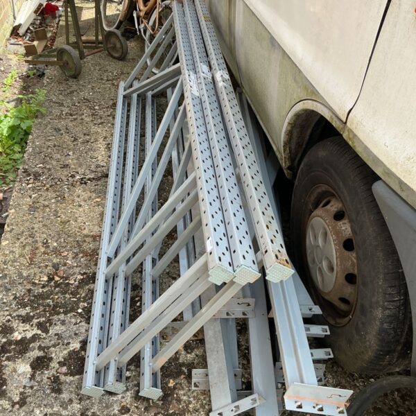 Metal garage shelving sections for storage and organization.