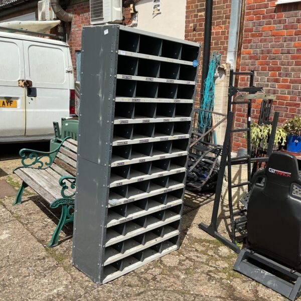 Large metal storage shelving unit, vintage industrial style.