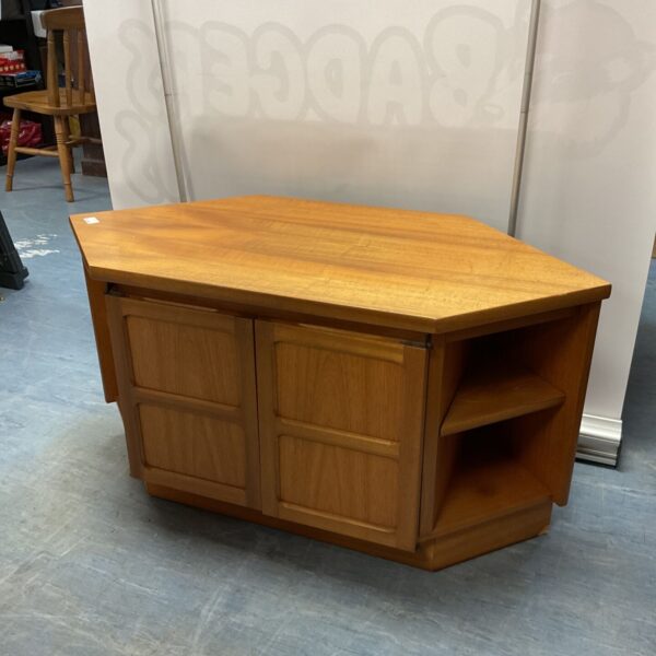 Vintage mid-century corner TV unit in wood.