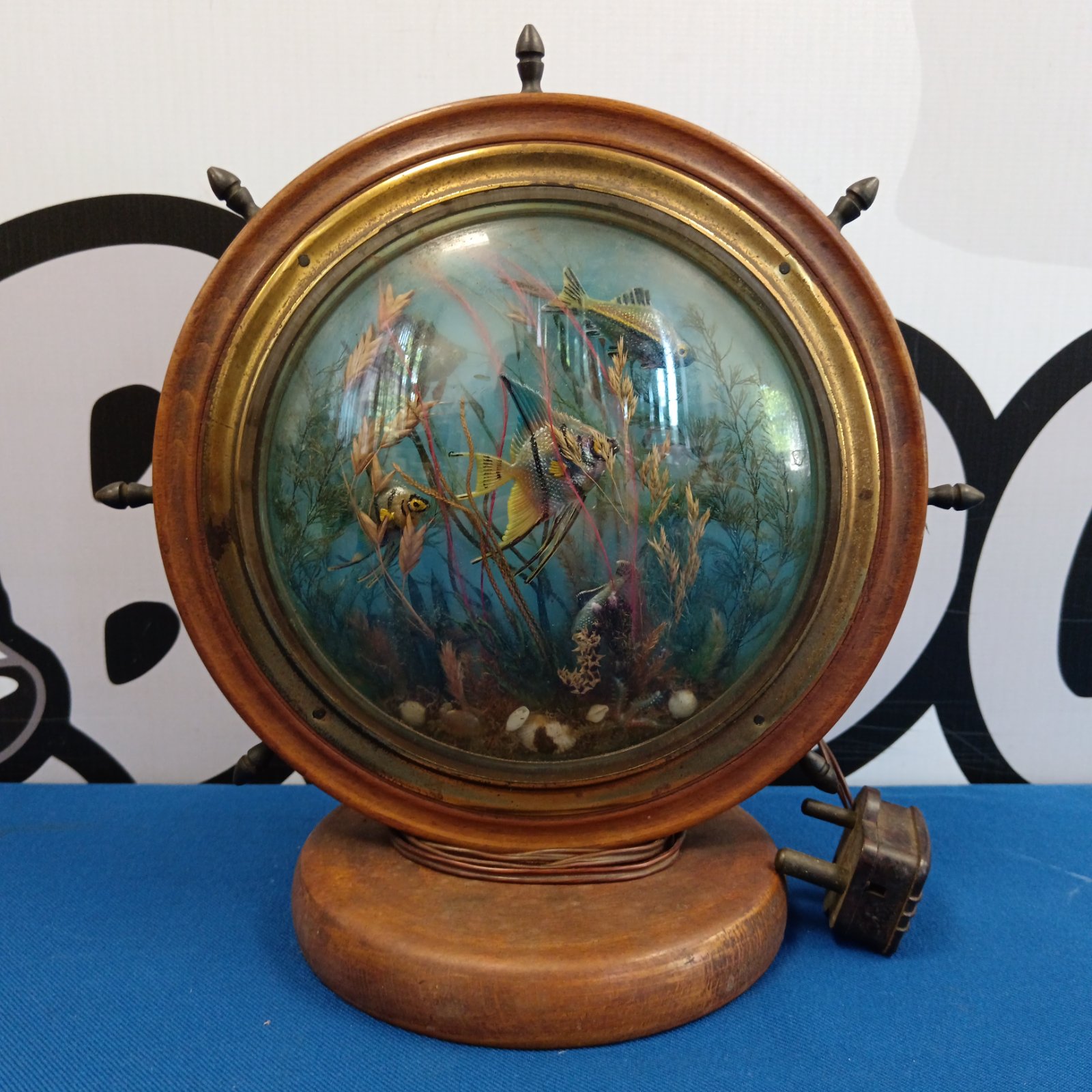 Vintage mid-century ships wheel lamp with fish diorama.