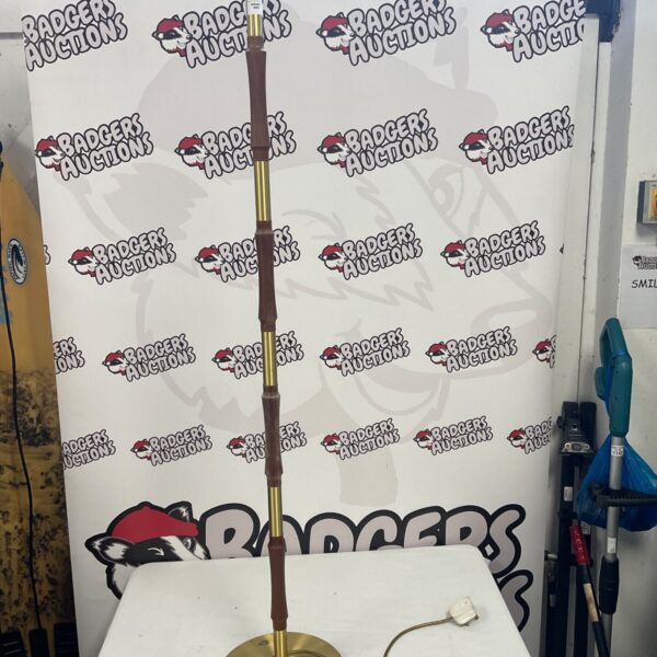 Vintage mid-century floor lamp with teak column and brass base.
